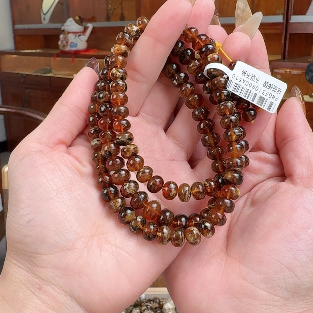 琥珀未镶嵌手串抚顺琥珀 血底花珀8M108