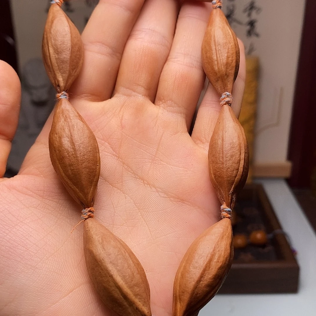 橄榄核吊坠 bbhhhbbbbbhhhhhbhhhn