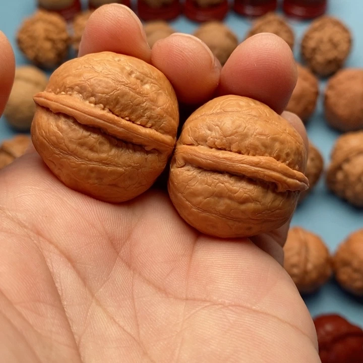 文玩核桃把件精品文玩手捻金佛元