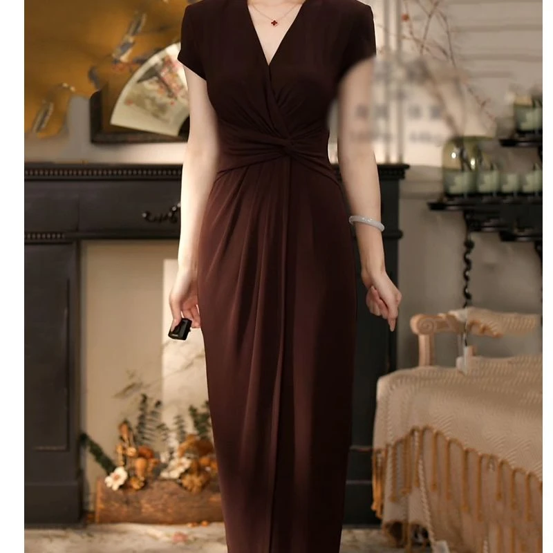 高级感洋气纯色扭结收腰大弹力包臀裙2025夏季新款气质优雅连衣裙