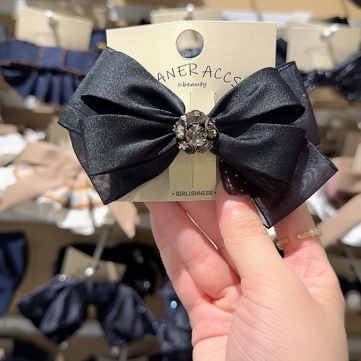 黑色蝴蝶结弹夹钻