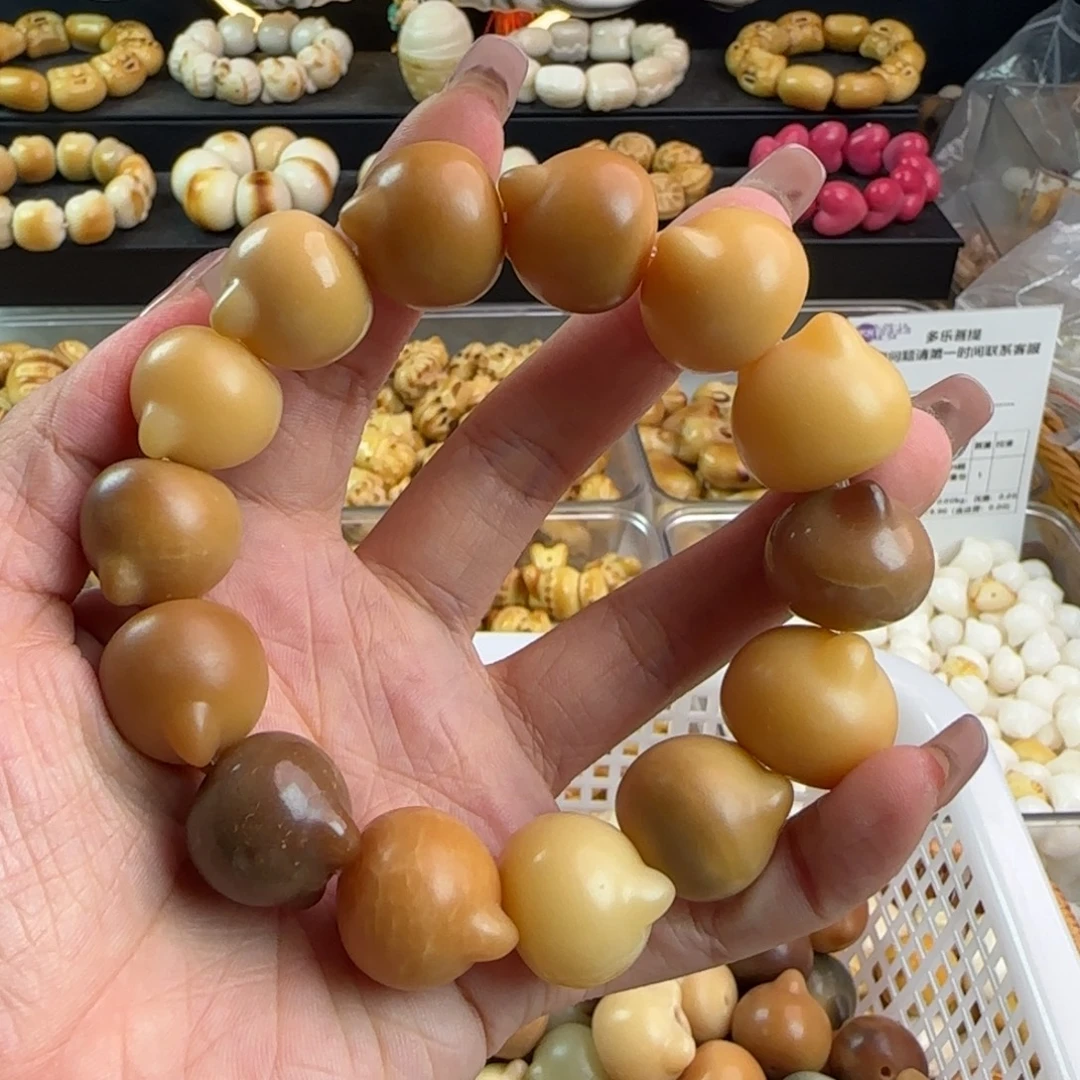 手串菩提根/象牙果瑕疵卡19+干磨猫头1串有裂