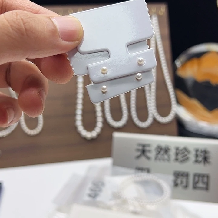 淡水珍珠银S925镶嵌耳饰