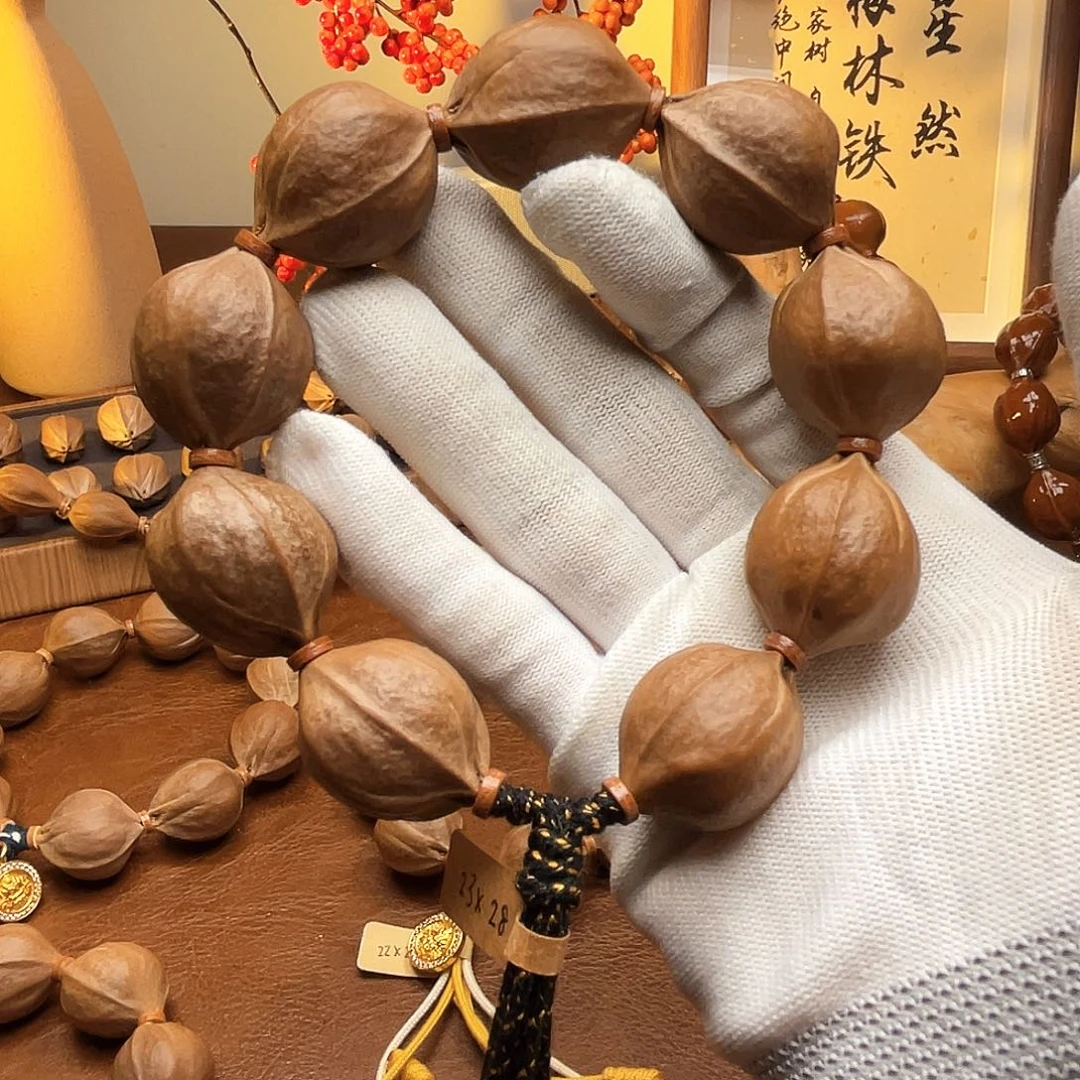 海***.手串橄榄核梅林铁核23*28