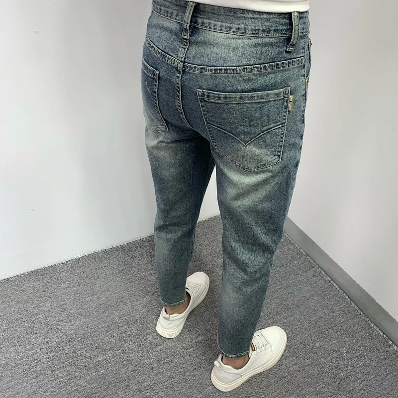 男士牛仔裤2025春夏新款韩版潮流修身小脚时尚破洞补丁高档九分裤