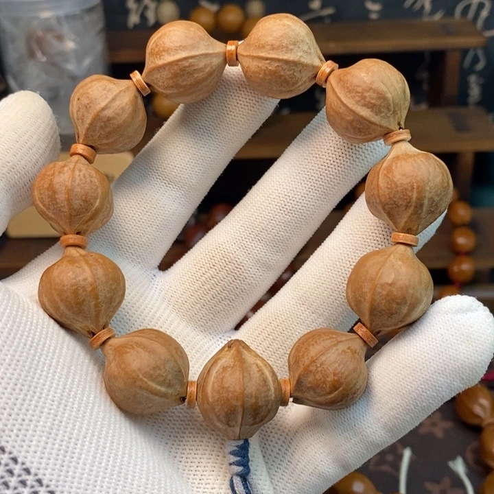 橄榄核手串/手链1.9铁核正圆蜜桃臀