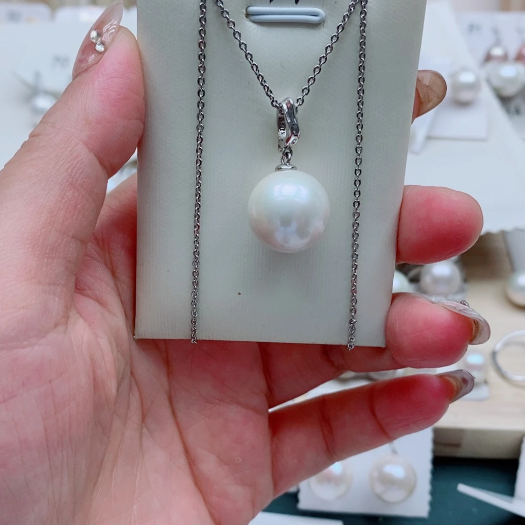 杨***杨银S925镶嵌耳饰淡水珍珠