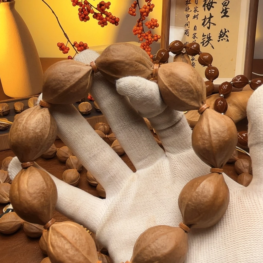 *****橄榄核手串梅林铁核22*30