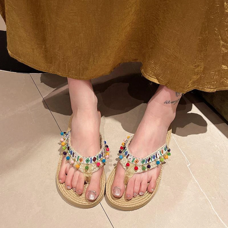 泰国草编拖鞋女夏外穿2025新款平底海边防滑度假民族风凉拖鞋女