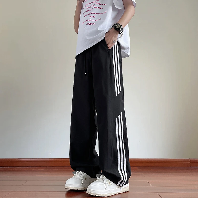 2025夏季男士冰丝裤港风时尚潮流学院风百搭学生条纹运动休闲长裤