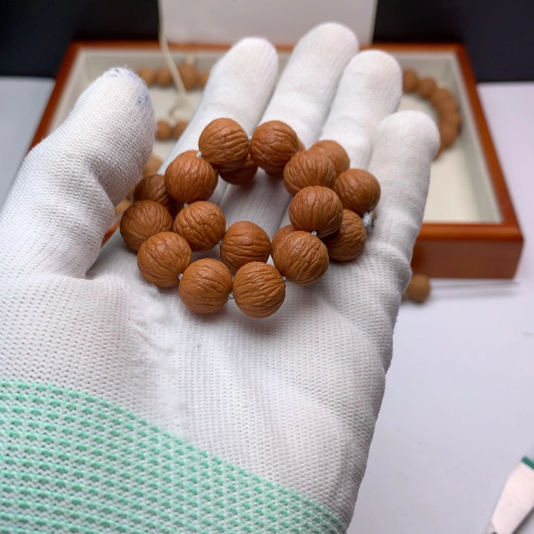 猴头核桃手串城****雨风雨