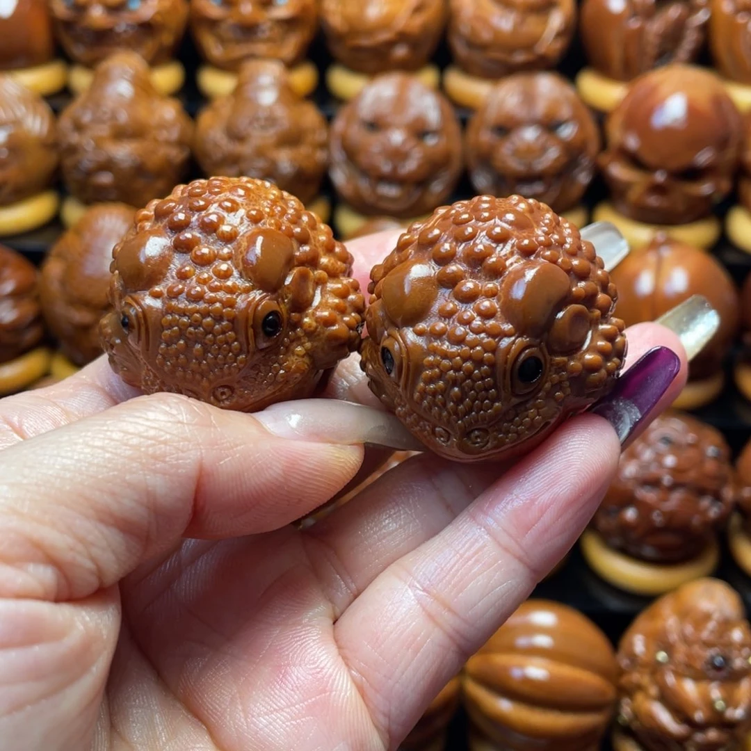 阿***沐把件橄榄核橄榄球