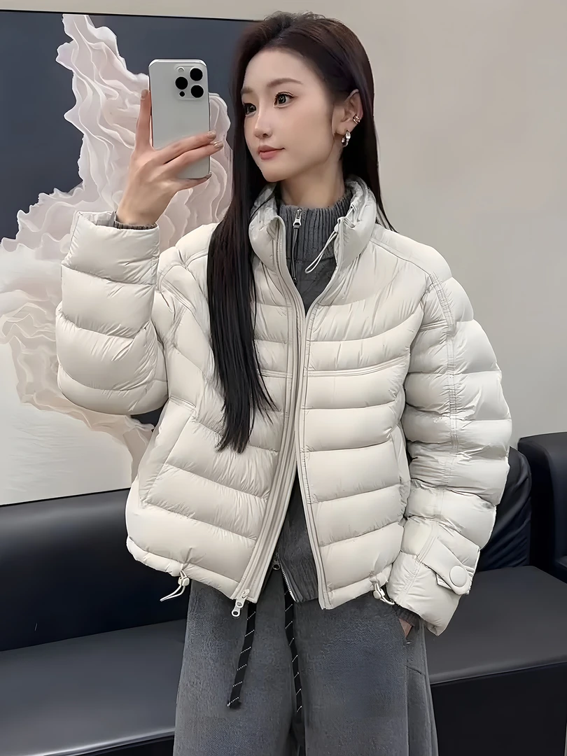 时尚韩版宽松连帽白鸭绒面包服2025年冬季新款纯色泡芙感羽绒服女