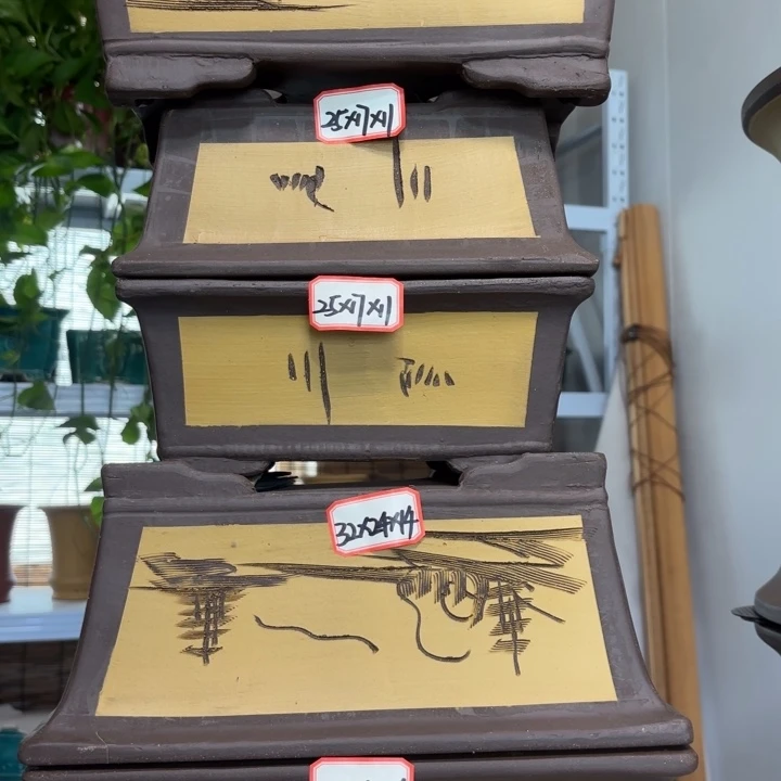 紫砂花盆100-5。