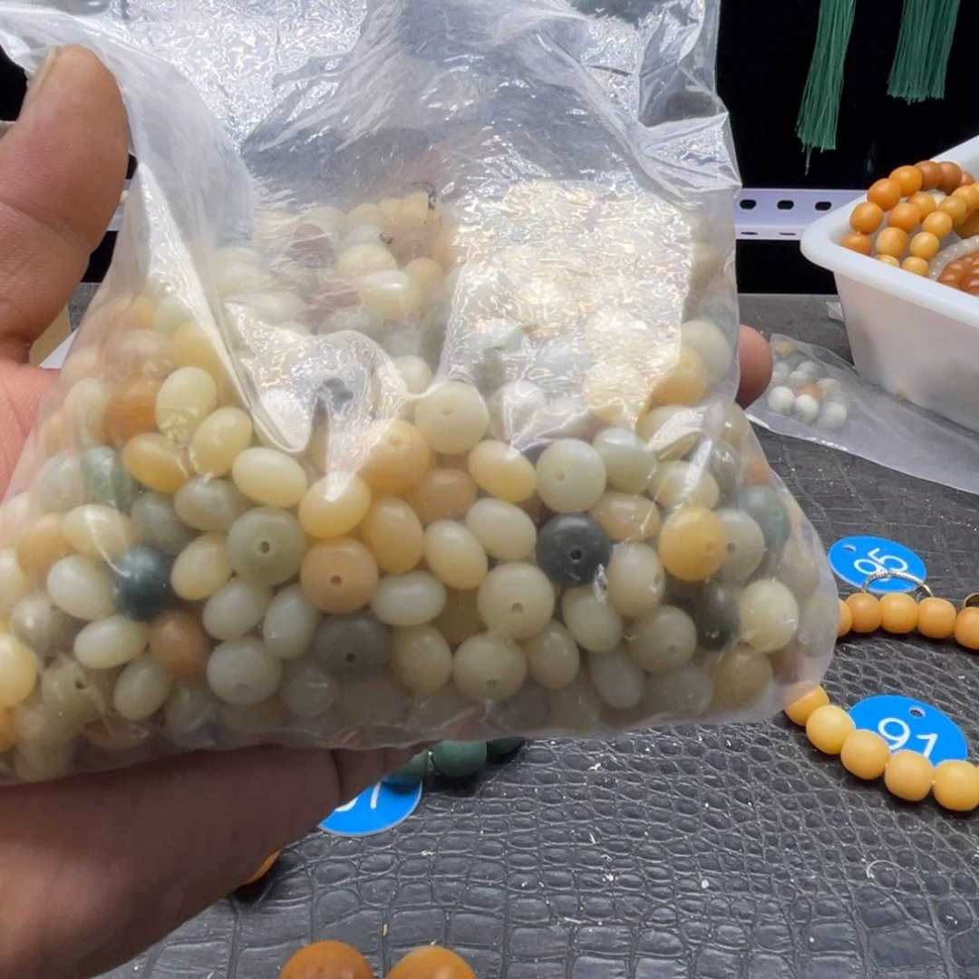 黎****霞纯白色55颗算盘珠自己串