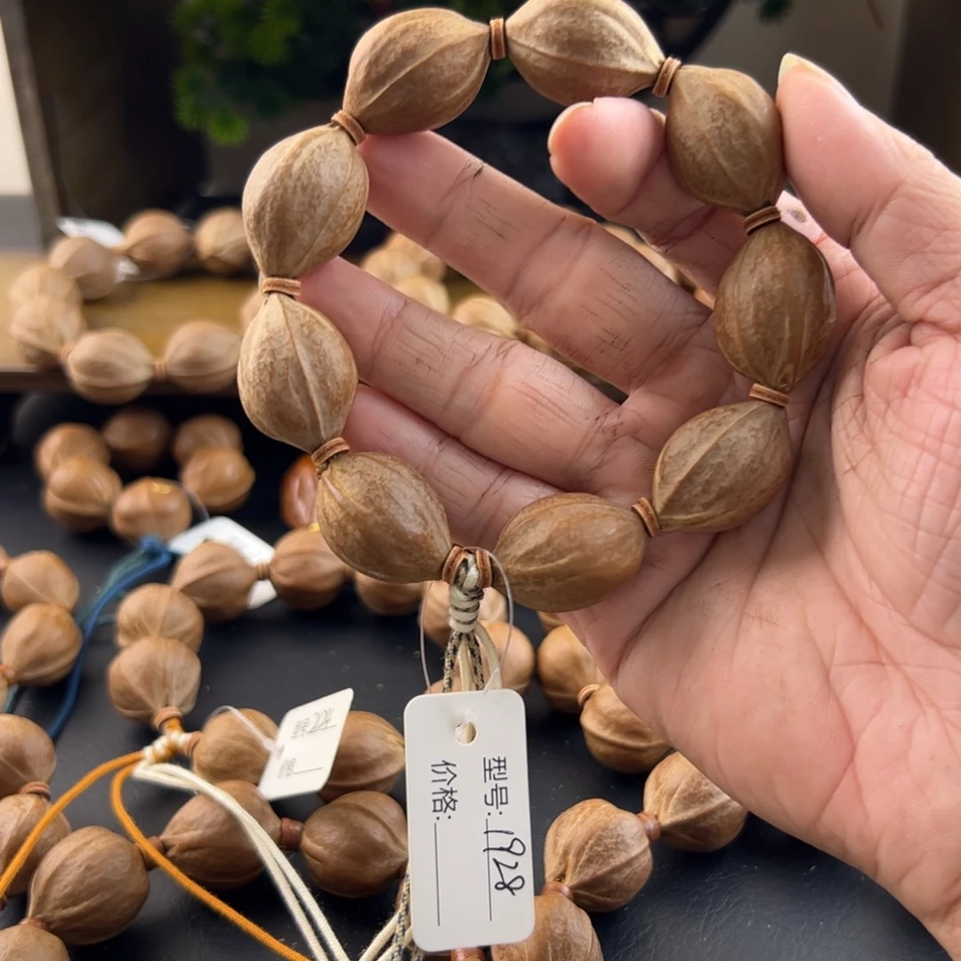 安***好橄榄核吊坠梅林铁核老树核素串1928