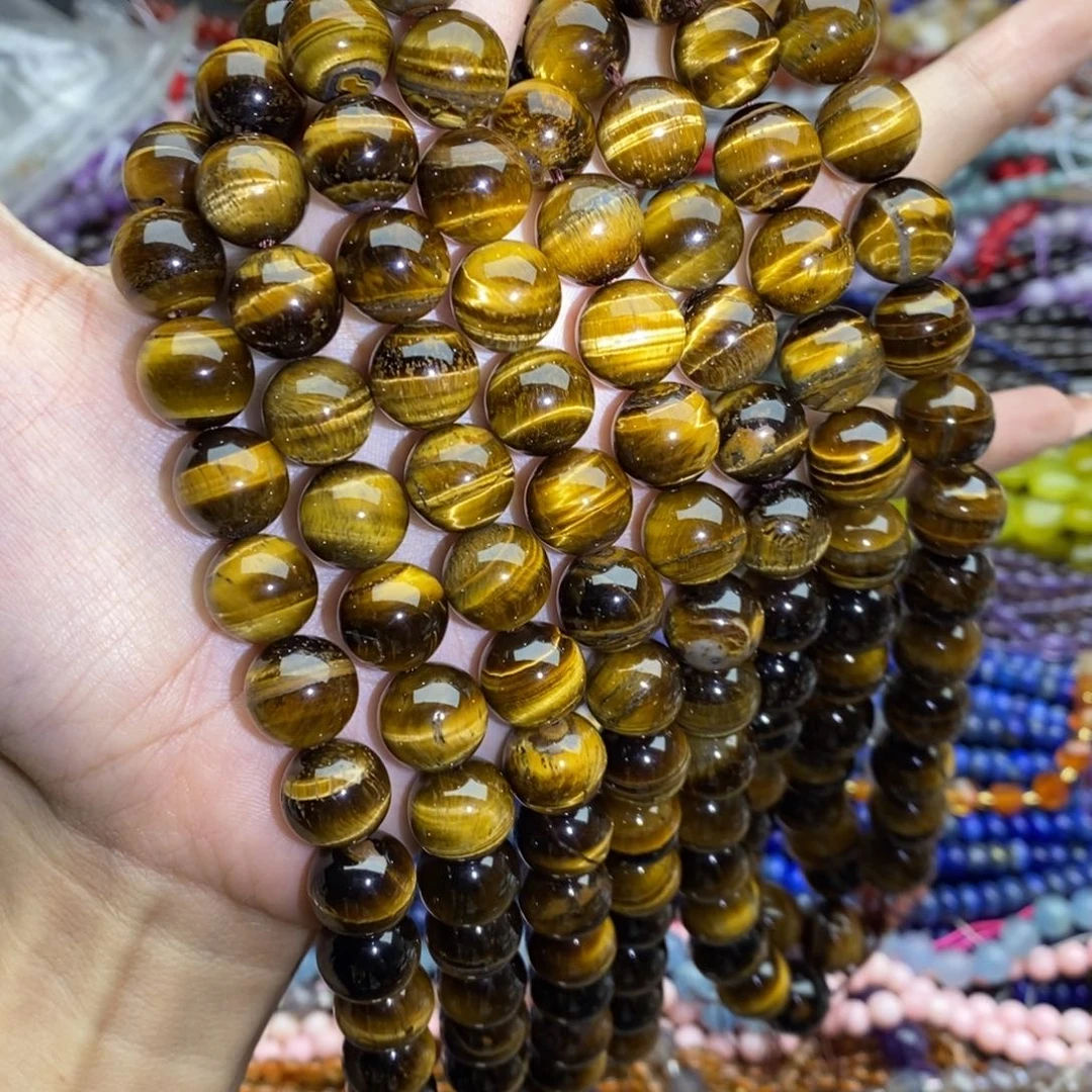 玛瑙/玉髓未镶嵌珠宝半成品一条纯天然黄虎石圆珠12mm一线天