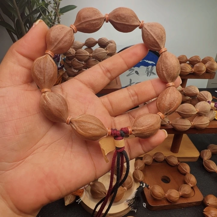 两***两手串橄榄核素串鲨鱼背17*25