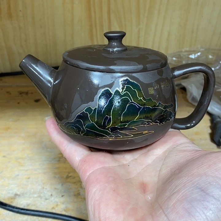 紫砂茶壶我也不知道