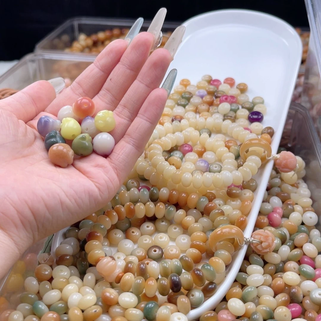 白玉菩提吊坠z9mm/400颗+10颗微瑕猫爪