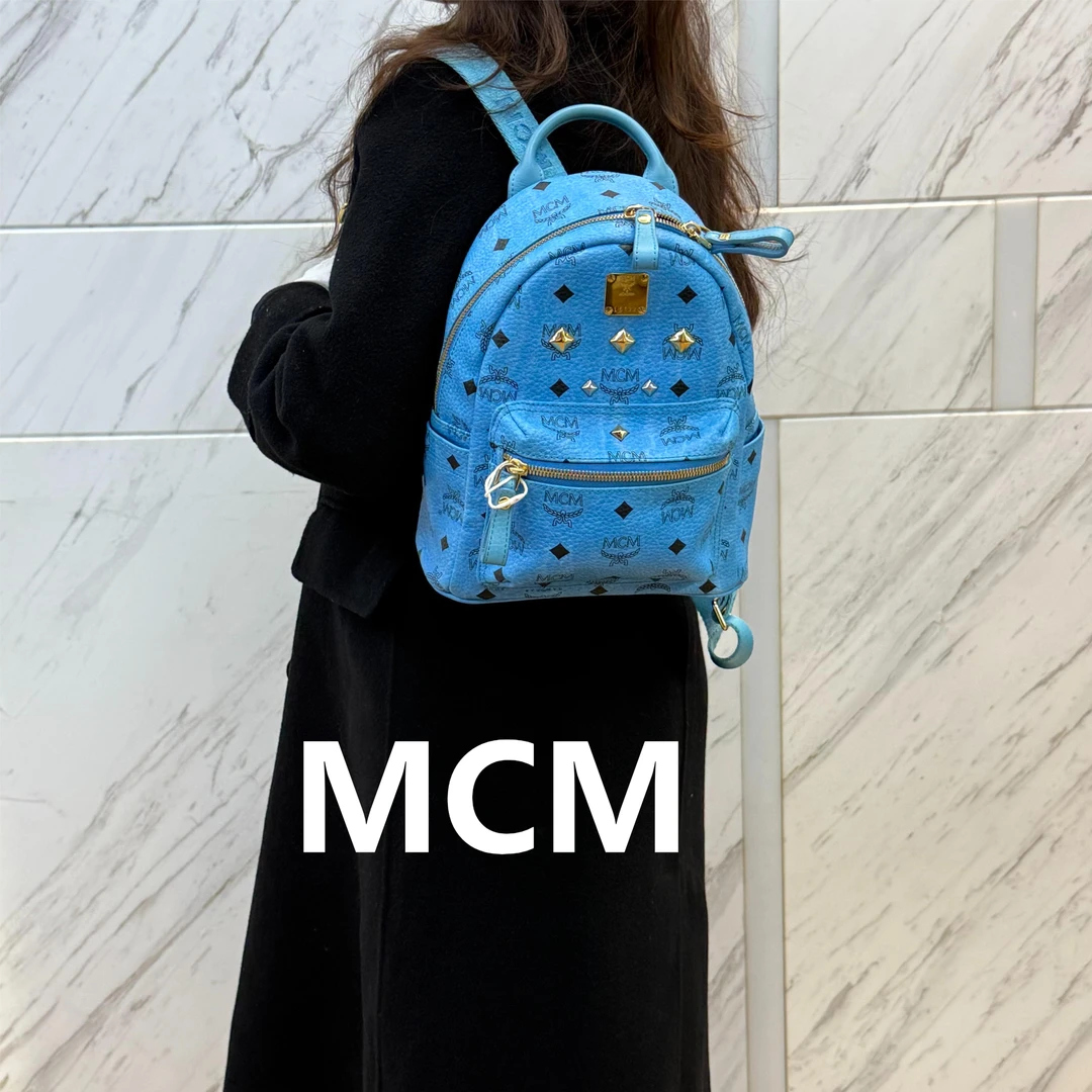 95新 MCM 蓝色小号双肩包/云海优选/H21380