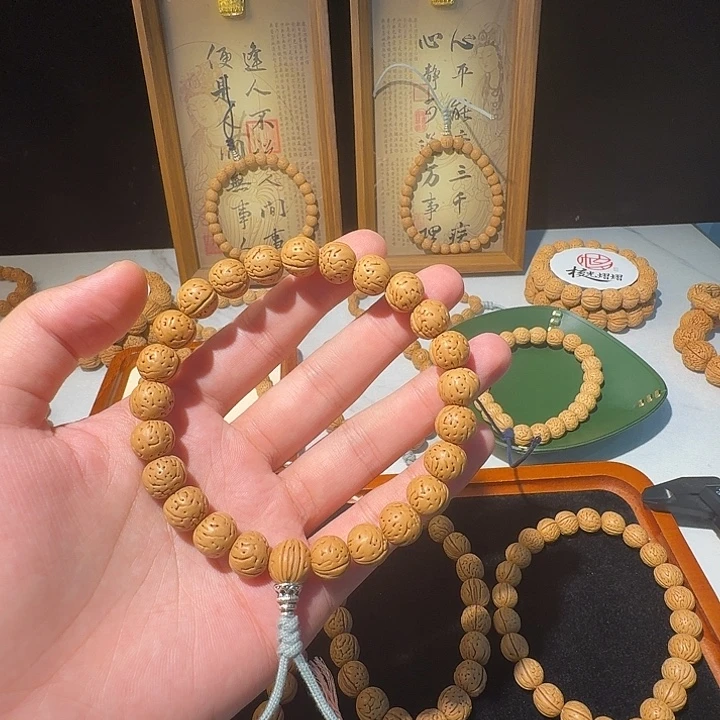 黑***豹手串桃核野生奶油球