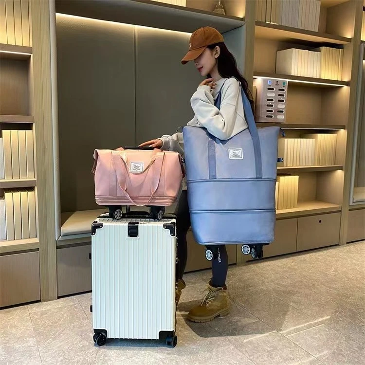 批发短途出差旅行包搬家手提行李袋自带万向轮干湿分离口袋待产包