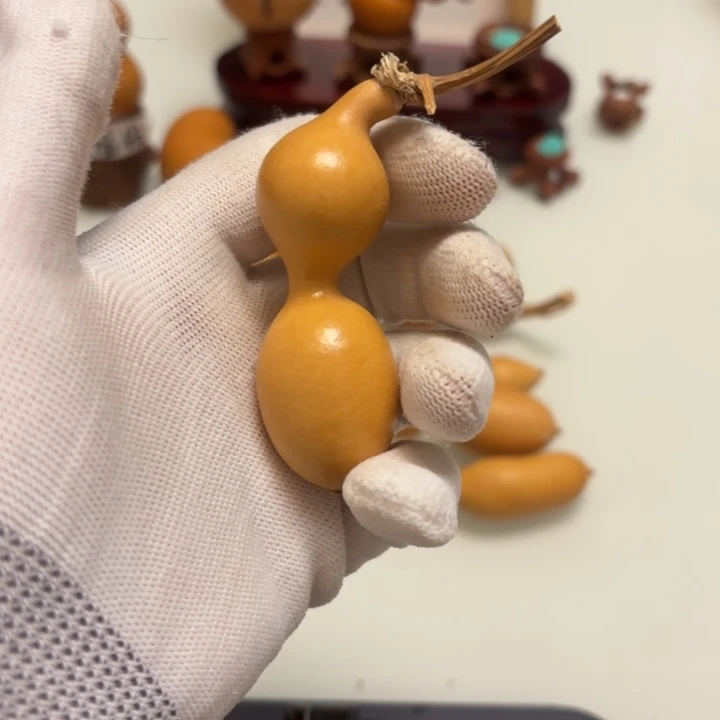 橘****天然手捻老皮葫芦