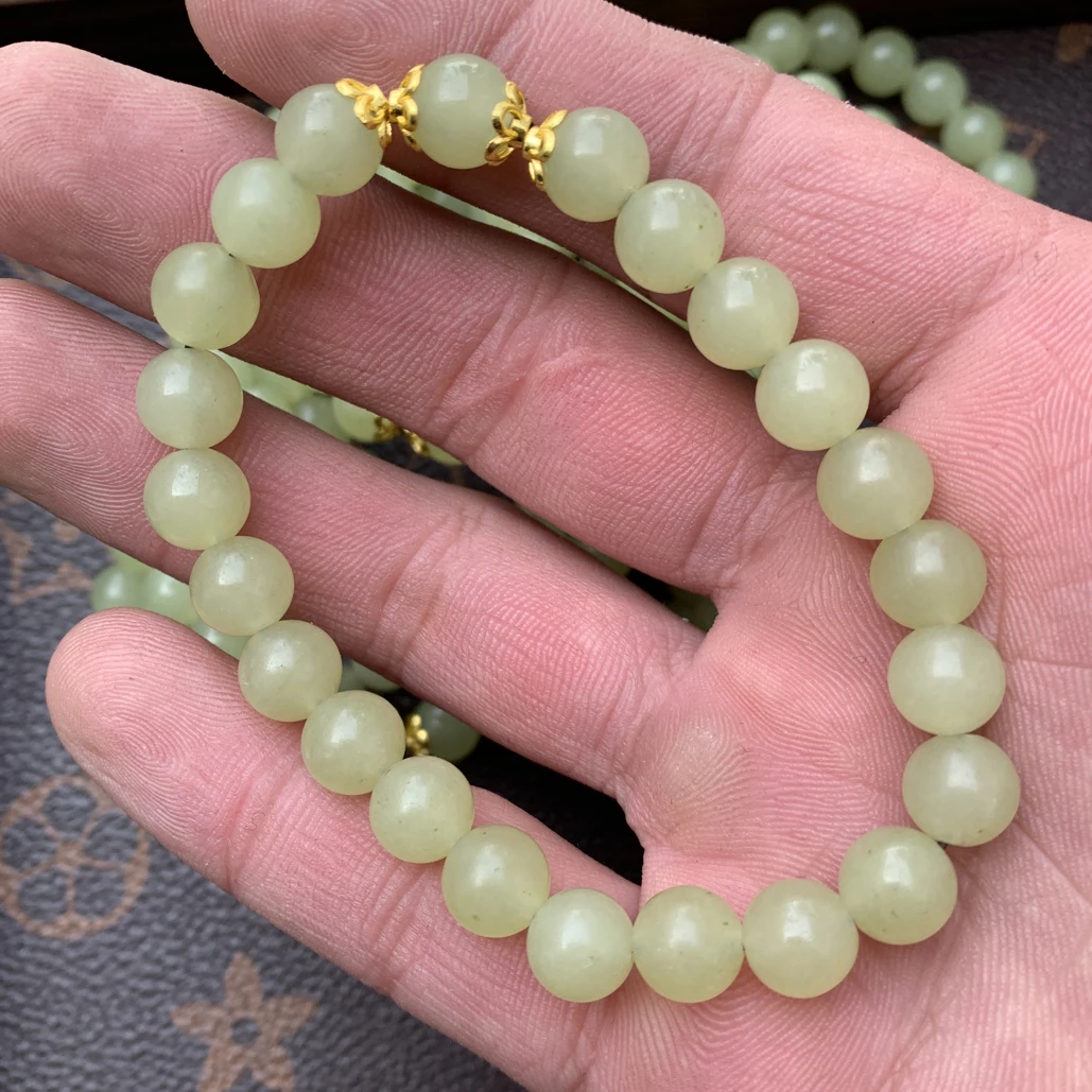 新疆和田玉黄口料卡八手串