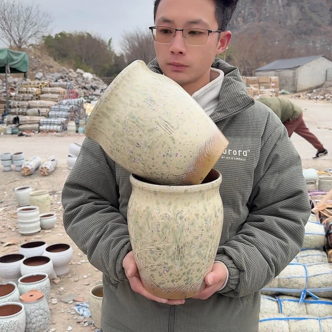 紫砂花盆口17高23（两个鸟彩色