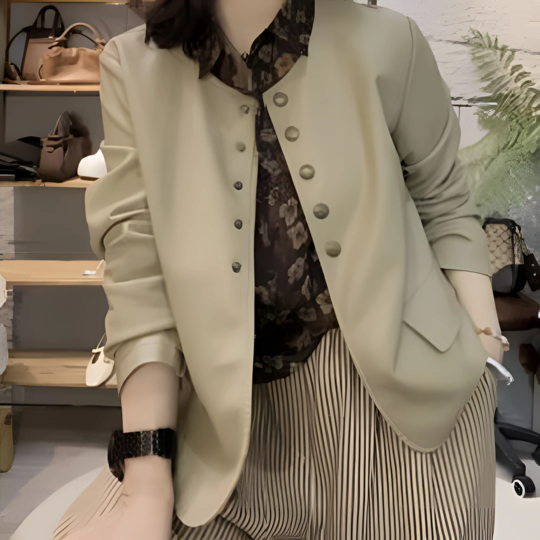 复古休闲百搭圆领长袖皮衣女2025春季新款别致独特小众设计感上衣