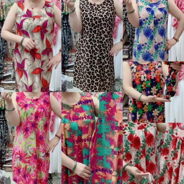 新款宽松吊带A字碎花连衣裙女夏季遮肚显瘦无袖背心裙