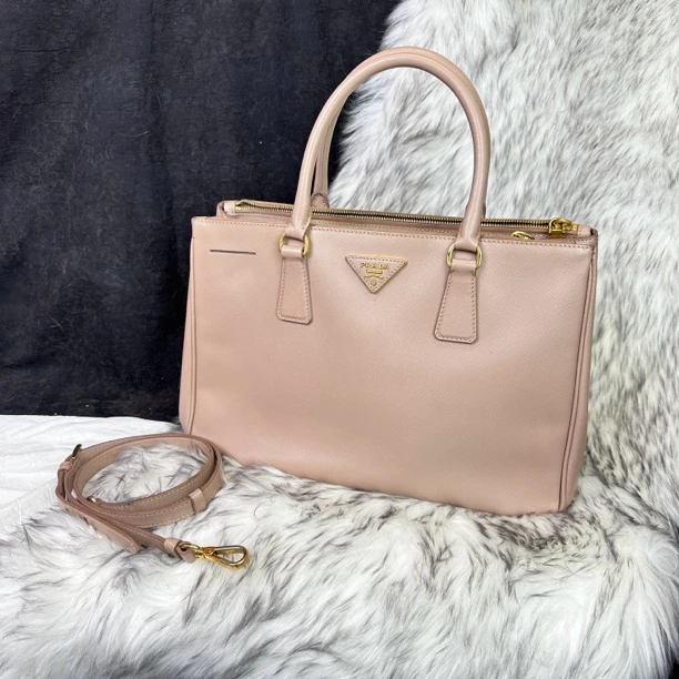 95新 Prada/普拉达 中号裸粉色杀手手提斜挎包