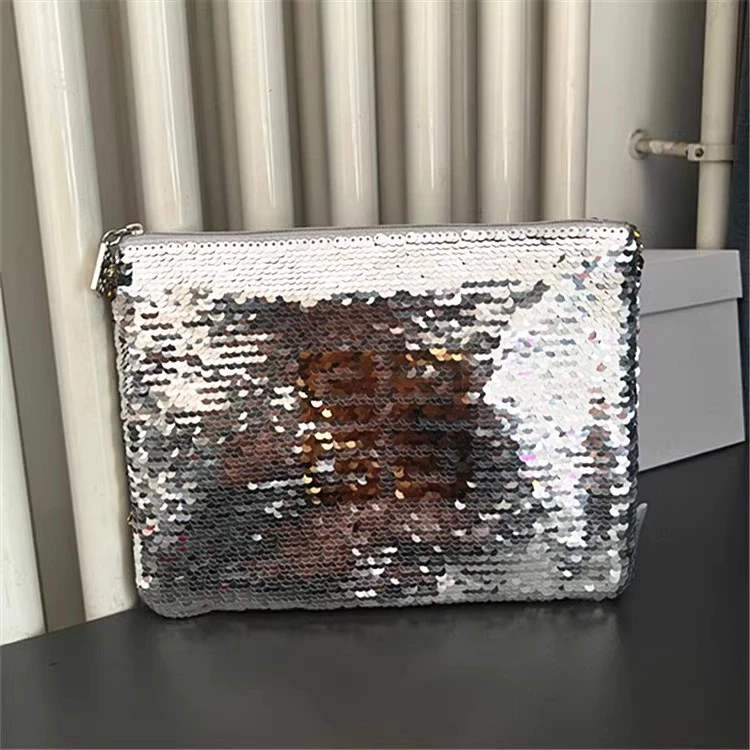 zx042国内专柜纪家限定银色亮片闪闪包化妆包收纳包手拿包