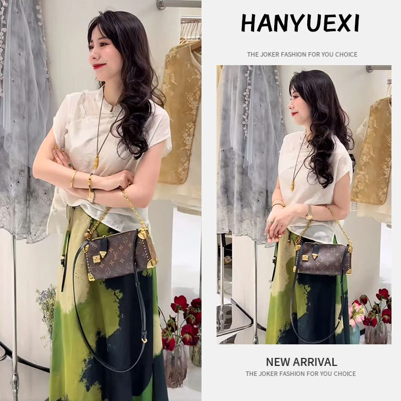 今年流行穿搭一整套2025新款新中式盘扣上衣轻奢水墨风半身裙套装