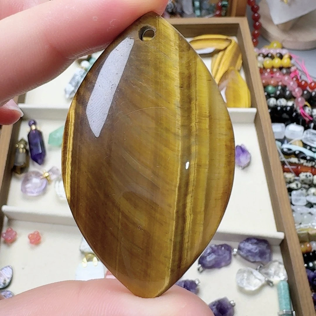 未镶嵌玛瑙/玉髓珠宝半成品虎眼吊坠一只