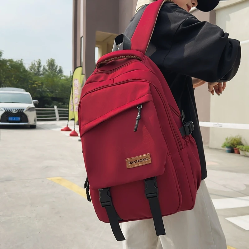 宽背带减负书包女初中生高中生大容量双肩包男纯色百搭大学生背包