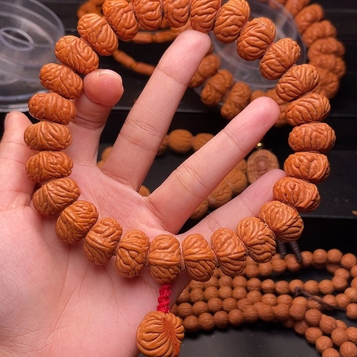 手串桃核白玉麒麟1.8