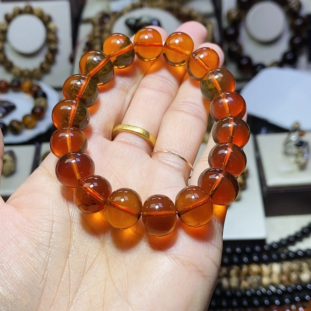 九***针琥珀未镶嵌裸石 樱桃红12mm