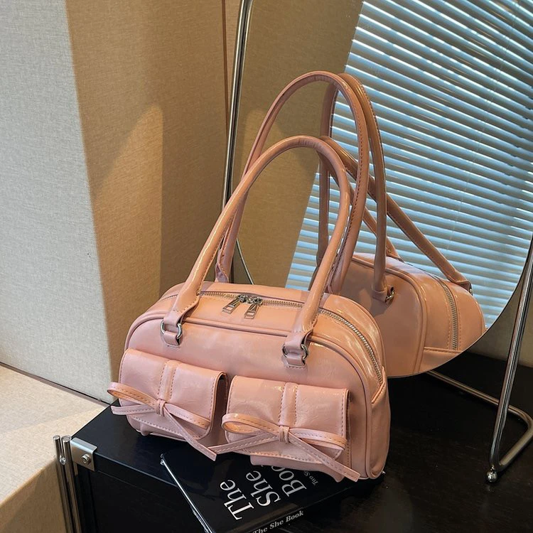 设计感大容量包包女2025超火新款单肩腋下包蝴蝶结绑带通勤枕头包