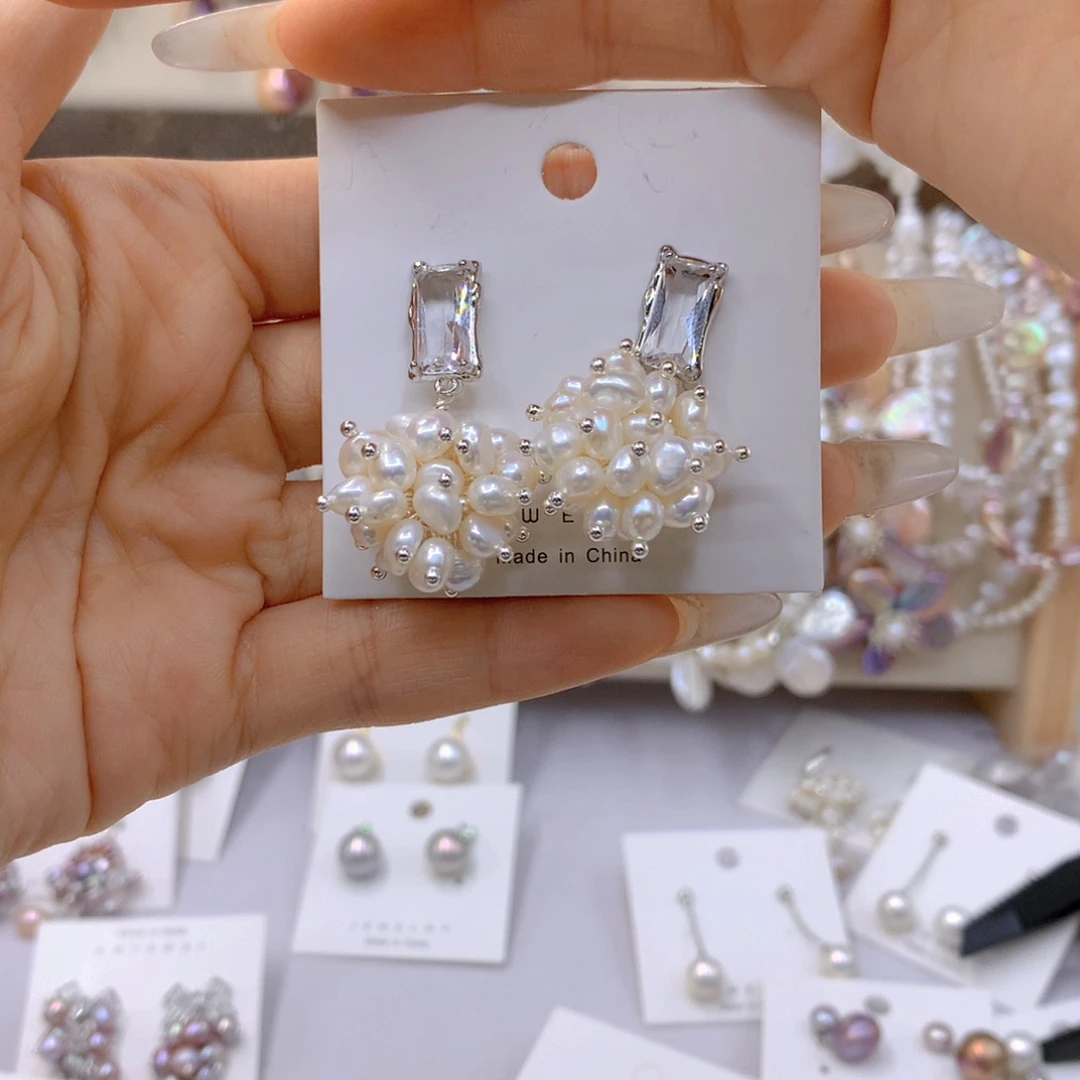 淡水珍珠耳饰银S925镶嵌大**?