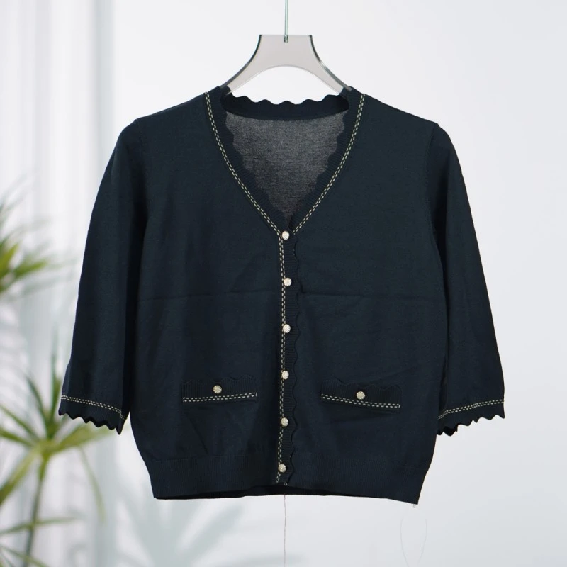 曼系列  O-623  女装时尚撤柜上衣针织衫黑色