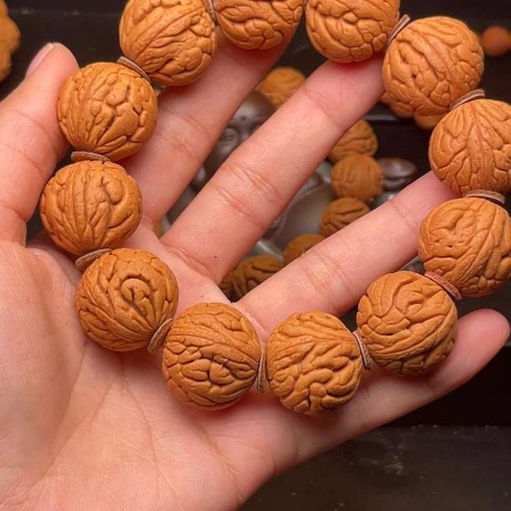 桃核手串金丝龙珠22