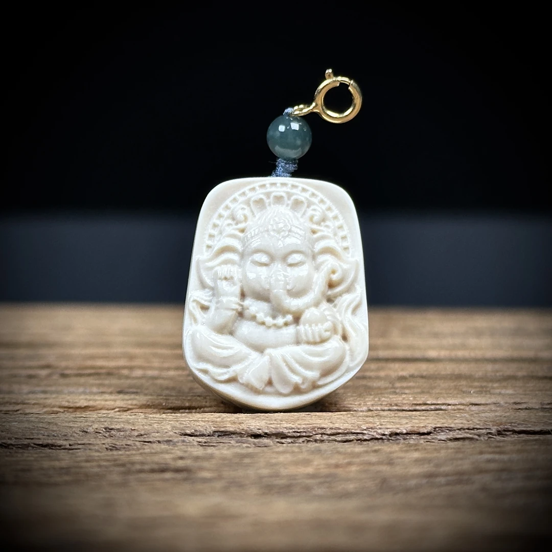 H41-11天然猛犸牙雕刻象神 约18.5*24*9mm支持鉴定 假一罚四