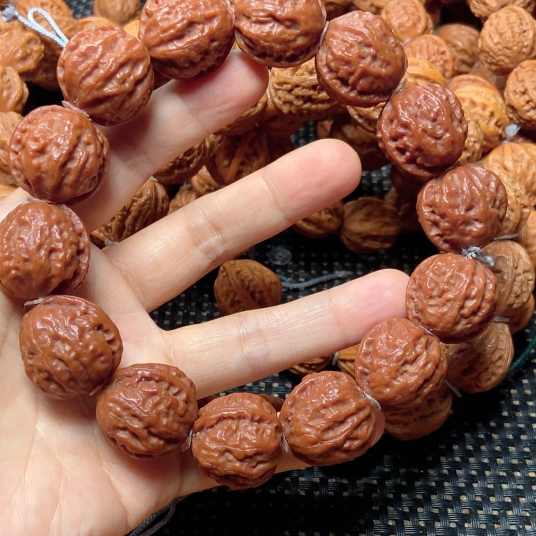 用***6桃核手串粗筋纽扣