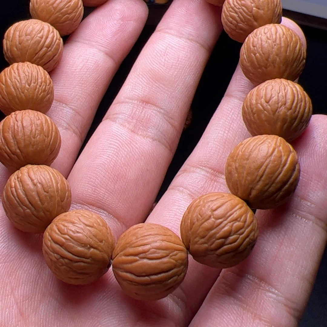 张***）猴头核桃吊坠哦据咯