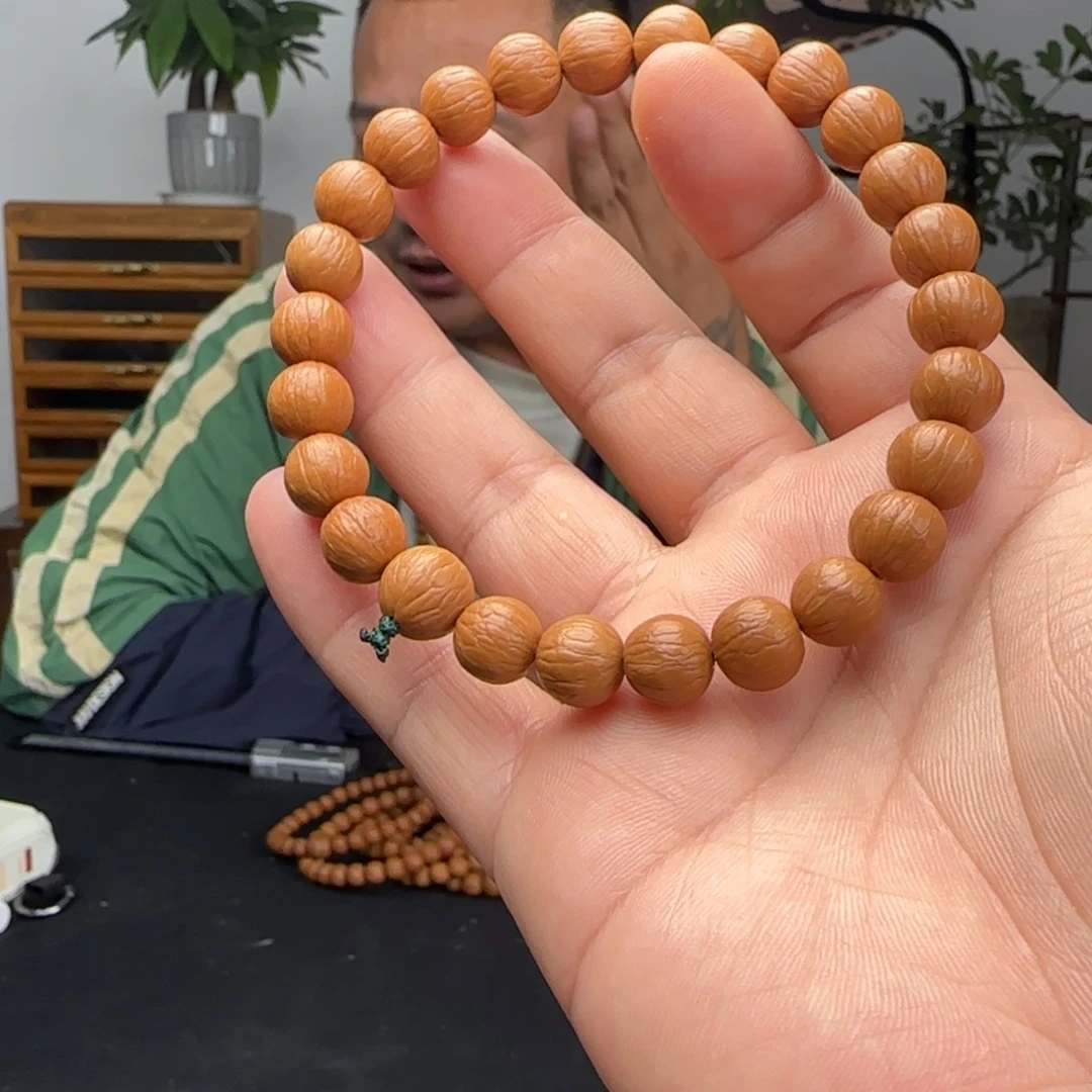 淮***丶猴头核桃手串聚宝盆