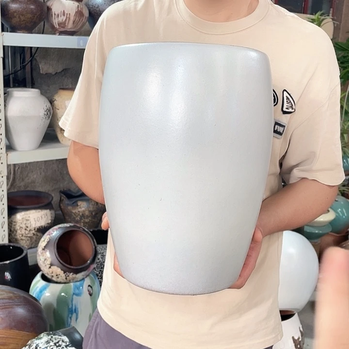 紫砂花盆正品口23高32。z z z