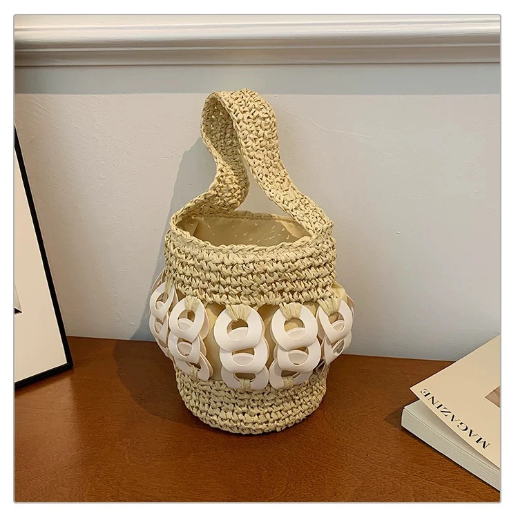 夏天草编小包包女2025超火新款独特小众设计水桶包休闲百搭斜挎包