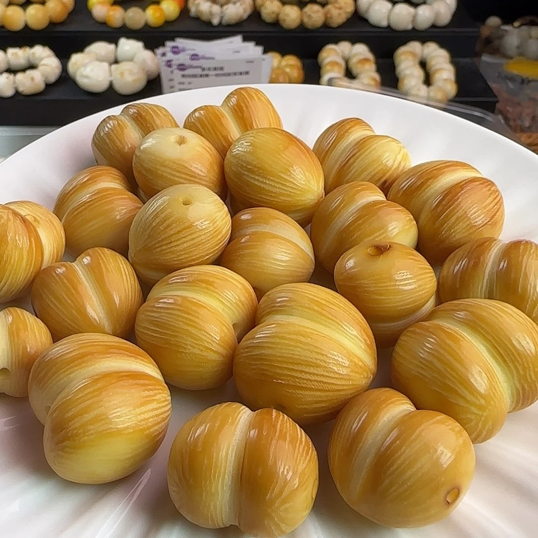 菩提根/象牙果吊坠微瑕疵炭烤拉丝屁桃5颗（大小随机）